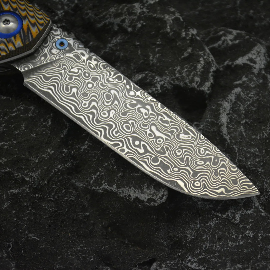 Winged Avian Damascus Folding Knife | G10 Handle & Zirconium Inlay | 59HRC