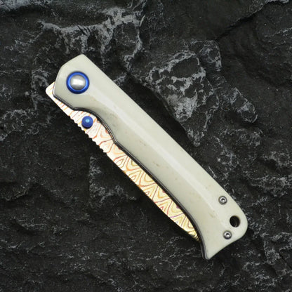 Winged Avian Damascus Folding Knife | G10 Handle & Zirconium Inlay | 59HRC