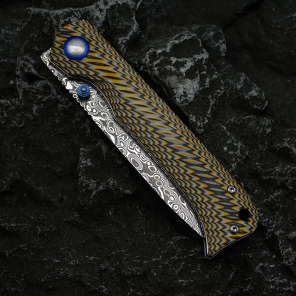 Winged Avian Damascus Folding Knife | G10 Handle & Zirconium Inlay | 59HRC